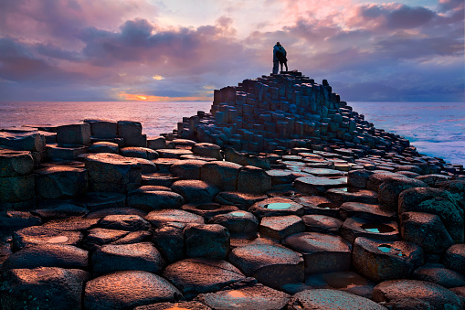 The Giant's Causeway is an area of about 40,000 interlocking basalt columns, the result of an ancient volcanic fissure eruption.  It is located in County Antrim on the north coast of Northern Ireland, about three miles (4.8 km) northeast of the town of Bushmills.