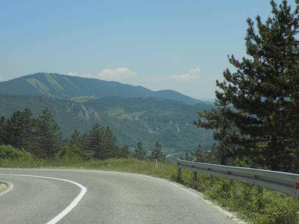 istock Winding road through the mountain 1208338534