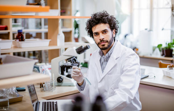 Portrait of a scientist in the laboratory Portrait of a scientist in the laboratory biologist stock pictures, royalty-free photos & images