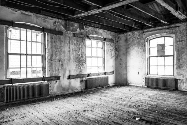 istock Abandoned school building interior with damaged floors and ceilings 1208338646