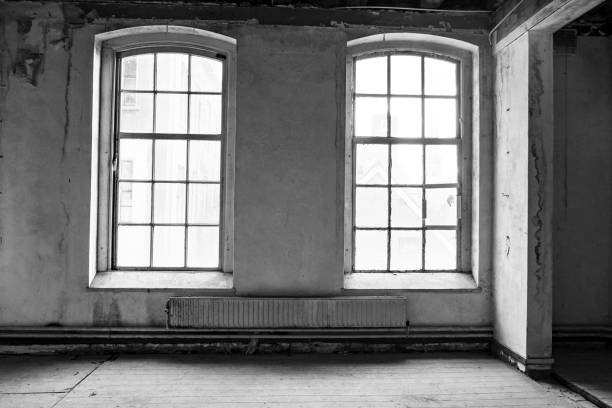istock Abandoned school building interior with damaged floors and ceilings 1208338683