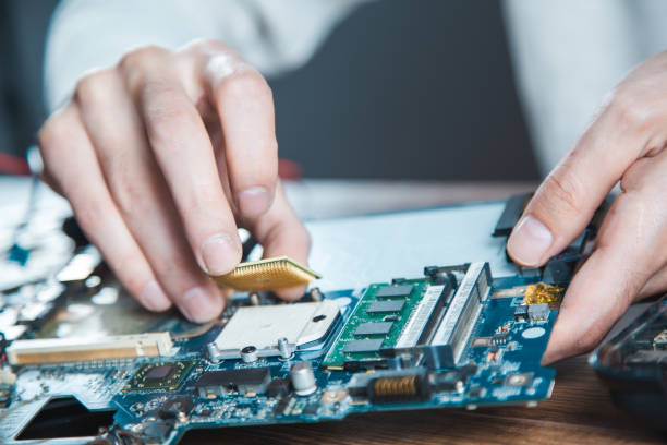 istock The technician is putting the CPU on the socket of the computer motherboard 1208342016