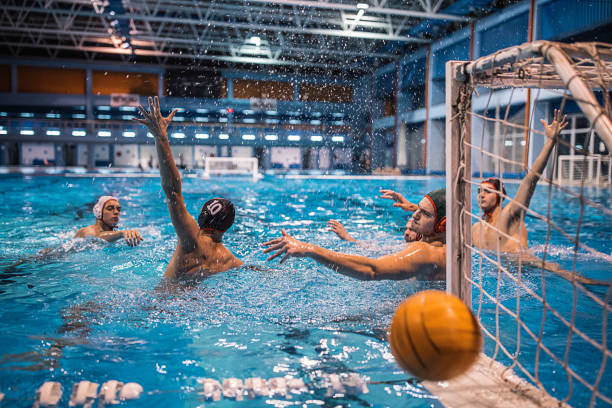 istock Young men playing water polo 1208342967