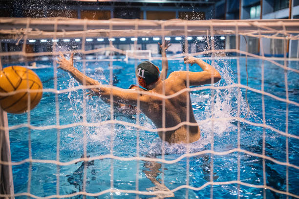 istock Scoring a goal in water polo match 1208343545