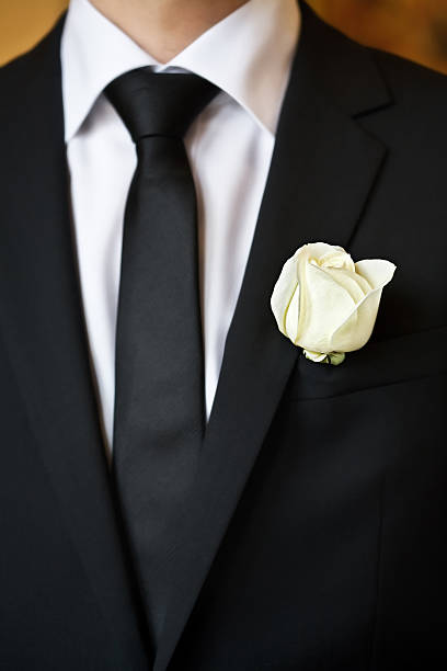 istock rose on the suit of groom 120834536