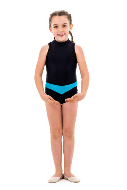 istock Girl child practice and doing rhythmic gymnastics portrait, white background. 1208345815
