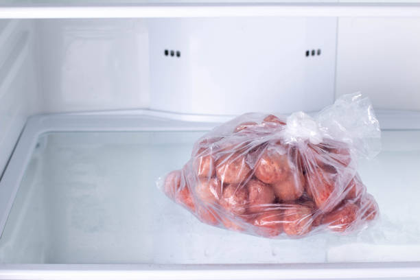istock Frozen Meatballs in refrigerator 1208345931