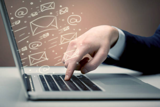 istock Sending client news letters on laptop 1208347134