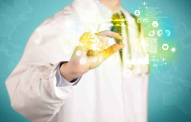 istock Doctor holding a pill between fingers 1208347341