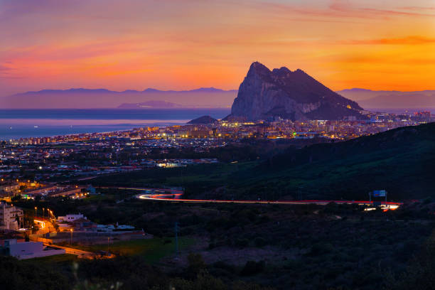 La Linea and Gibraltar - view from Mirador El Higueron Mirador El Higueron is a great place to get a long shot of the Rock.
The Rock of Gibraltar, also known as the Rock, is a monolithic limestone promontory located in the territory of Gibraltar, near the southwestern tip of Europe on the Iberian Peninsula. mirador stock pictures, royalty-free photos & images
