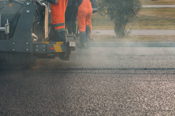 istock Asphalt paving. Paver machine and road roller. New road construction. 1208350590