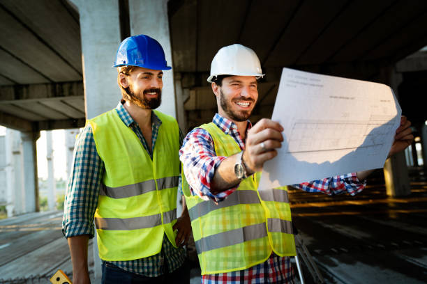 istock Architects, business manager and engineer meeting project at construction site 1208350619