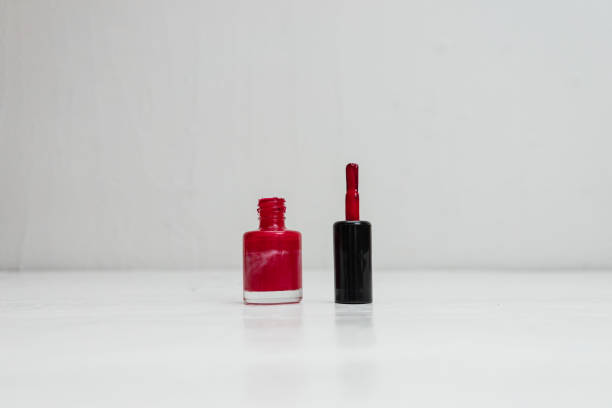 istock Red colorful and bright nail polish isolated with copy space. 1208350759
