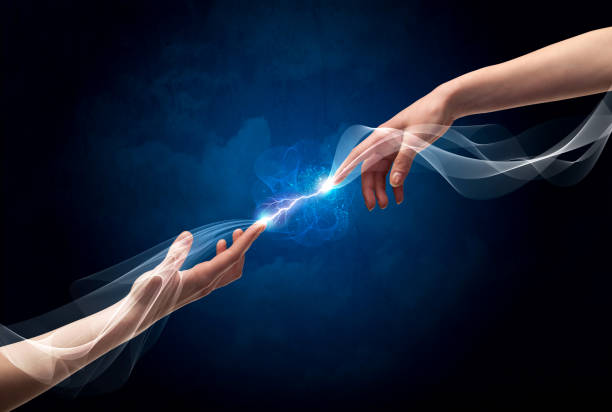 istock Hands connecting through fingers in space 1208350769
