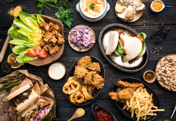 istock Different food cooked on a wooden dark table 1208351564