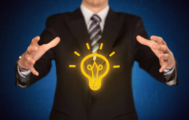 istock Sales guy has bright idea in the hand 1208352181