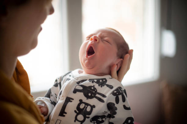 istock Newborn Baby Boy Yawning 1208357062