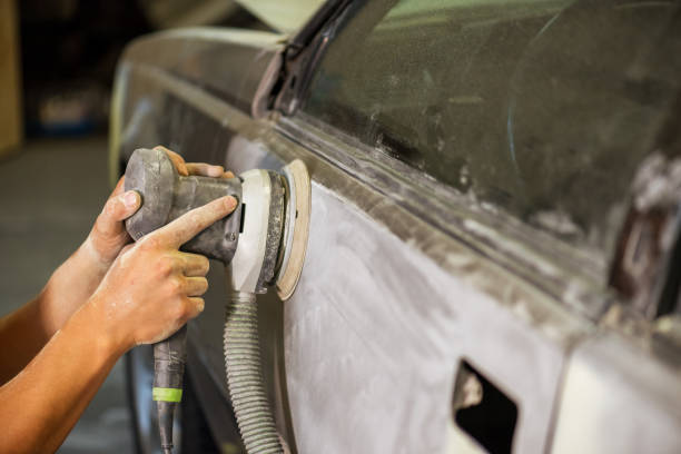 istock Bulgarian mechanic working in auto shop. 1208361289