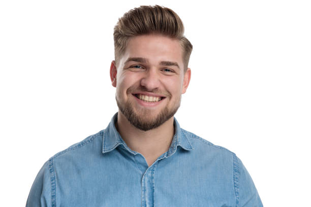 istock Cheerful casual man laughing and looking forward 1208361629