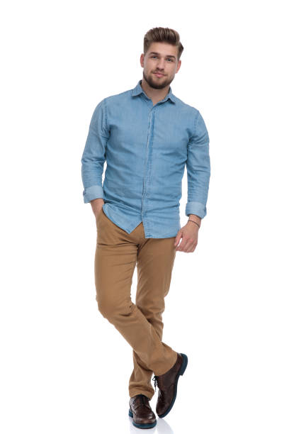 istock Charming casual man posing with his hand in his pocket 1208362451