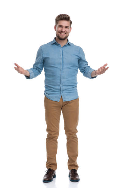 istock Cheerful casual man welcoming and smiling 1208362729