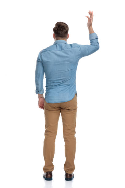 istock Rear view of a bothered casual man arguing and gesturing 1208363072