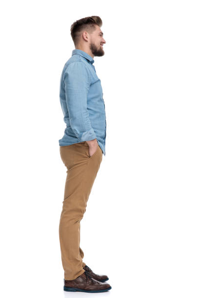 istock Side view of a positive casual man standing 1208364332