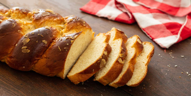 istock Easter greek tsoureki braid, sweet bread brioche on wood 1208364408