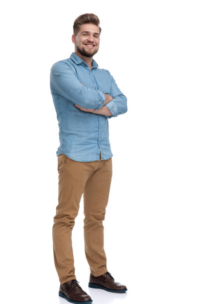 istock Cheerful casual man laughing with his hands crossed 1208364528