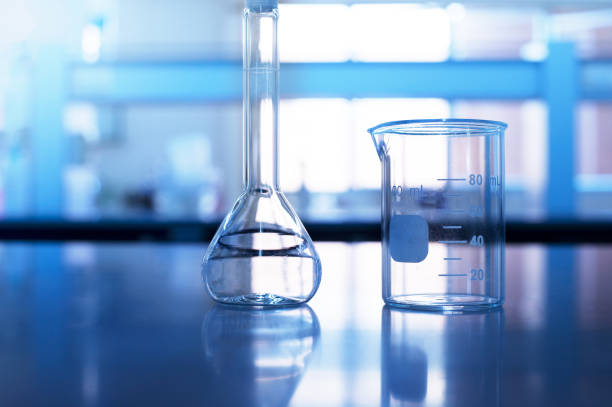 istock beaker and volumetric flask on chemistry science laboratory table background 1208365244