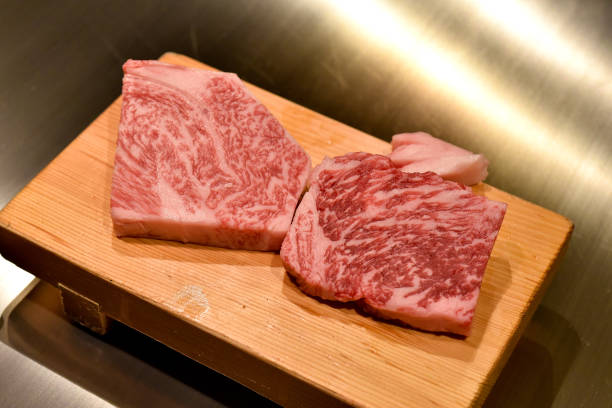 istock Wagyu beef steak, Chef present the luxury A5 grade kobe meat on cutting board, Premium finest cuisine dinner. 1208366642