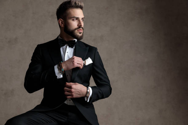 istock Pensive groom looking away with hope while wearing tuxedo 1208367019