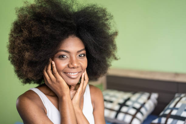 istock Portrait of afro woman 1208367347