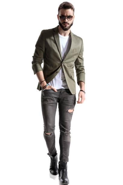istock Confident model holding his hand in his pocket 1208367476