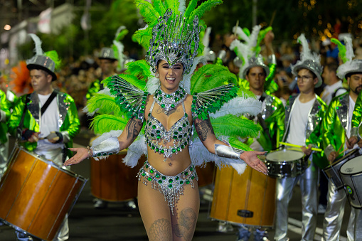 FUNCHAL, PORTUGAL - FEBRUARY 2020: Participants of Madeira island Carnival dancing in the parade in Funchal city, Madeira island, Portugal.