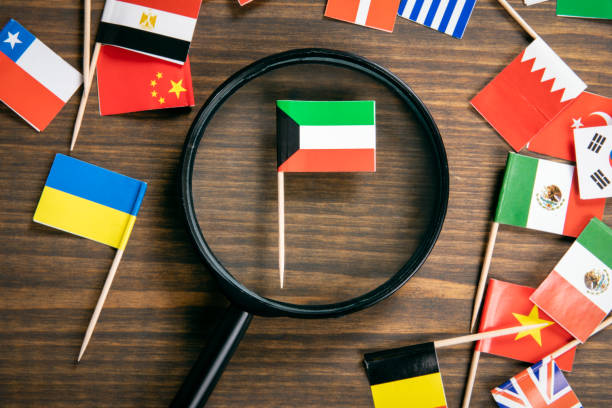 istock Kuwait flag. Flags of many countries, magnifying glass on table 1208373002
