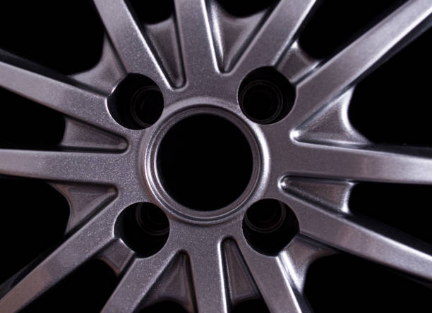 istock Landing hole in a cast modern car disk, background, industry 1208374766