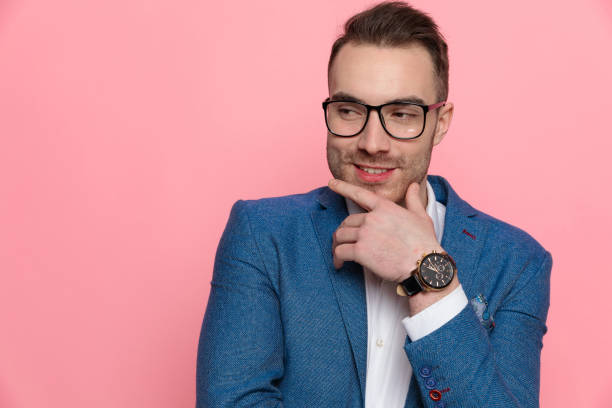 istock Cheerful smart casual man laughing with hand on his chin 1208375802