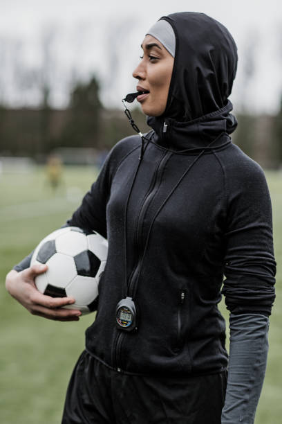 istock Beautiful Young Female Muslim Referee 1208376080
