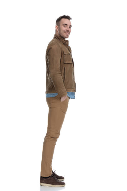 istock Side view of confident casual man smiling 1208376162