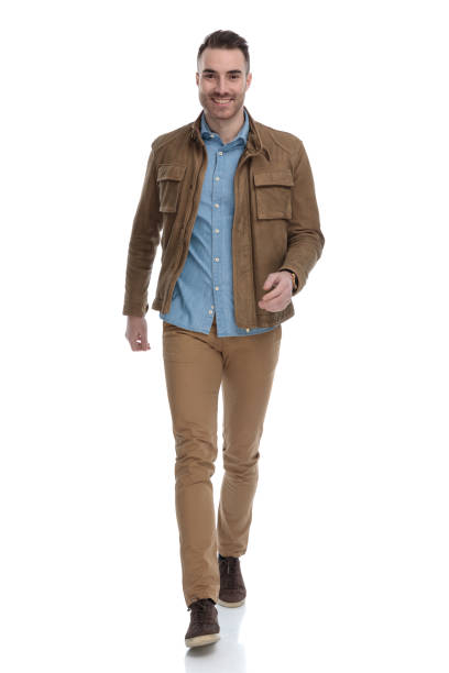 istock Happy casual man laughing while wearing a leather jacket 1208376244