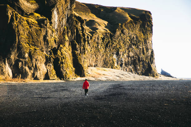 istock Man exploring the Iceland wilderness during sunrise 1208378601