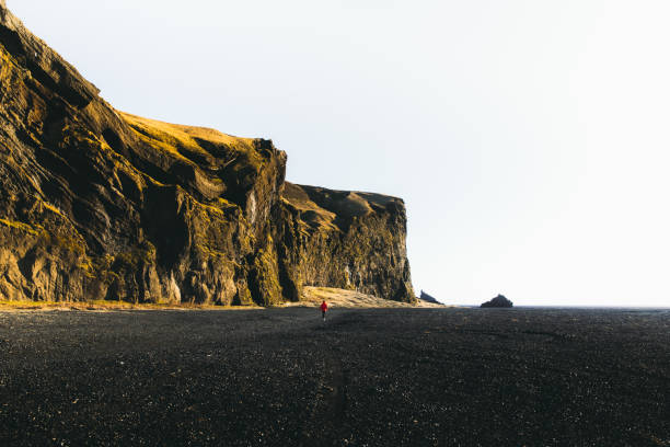 istock Man exploring the Iceland wilderness during sunrise 1208378846