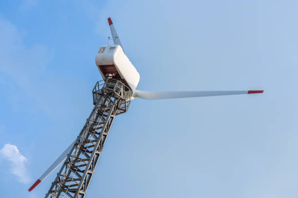 istock Wind turbine renewable energy source summer with blue sky 1208381925