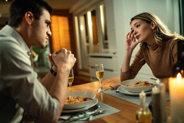 Sad Couple Dinner Table Stock Photos, Pictures & Royalty-Free Images ...