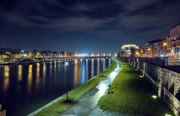 istock Vistula River in Krakow at night. 1208386064