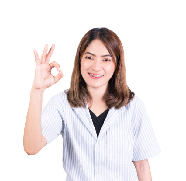 istock woman showing OK hand sign on white background 1208387011