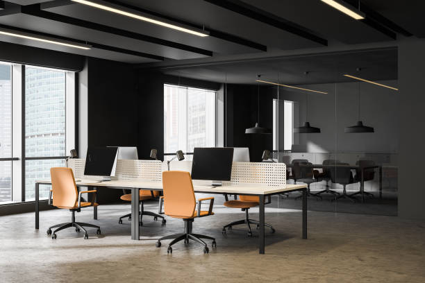 istock Dark gray open space office and meeting room 1208388774