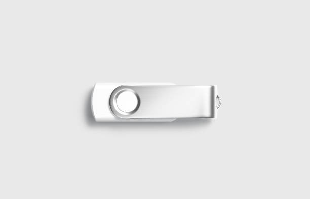 Blank white closed usb stick mock up, gray background Blank white closed usb stick mock up, gray background, 3d rendering. Empty connection adapter with metal cap mockup, isolated. Clear memo portable modem or micro key mokcup template. for sale flash stock pictures, royalty-free photos & images