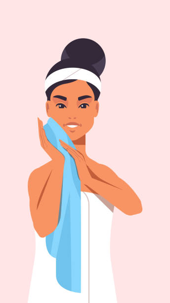 młoda kobieta czyszczenie twarzy z niebieskim ręcznikiem dziewczyna wycierając twarzy skóry skóry spa relaks koncepcji leczenia portret - clear sky human skin towel spa treatment stock illustrations
